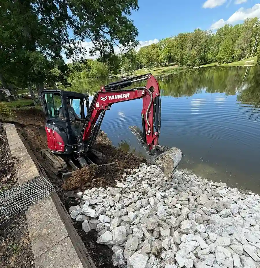 Revival Land Management Excavator Rip Rap